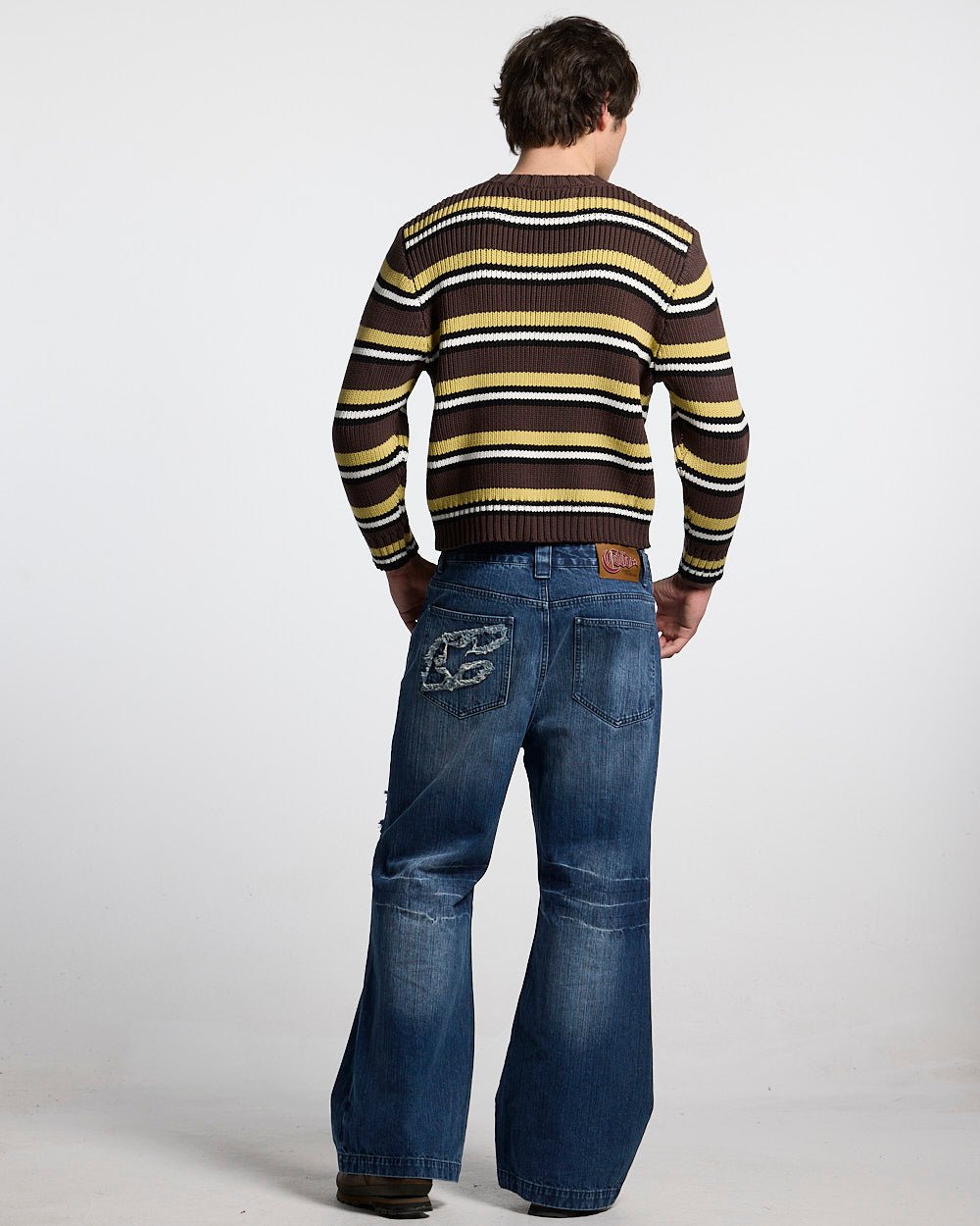 TIMELESS KNITWEAR BROWN - brown striped knit sweater, back view on male model - Cold Culture #man