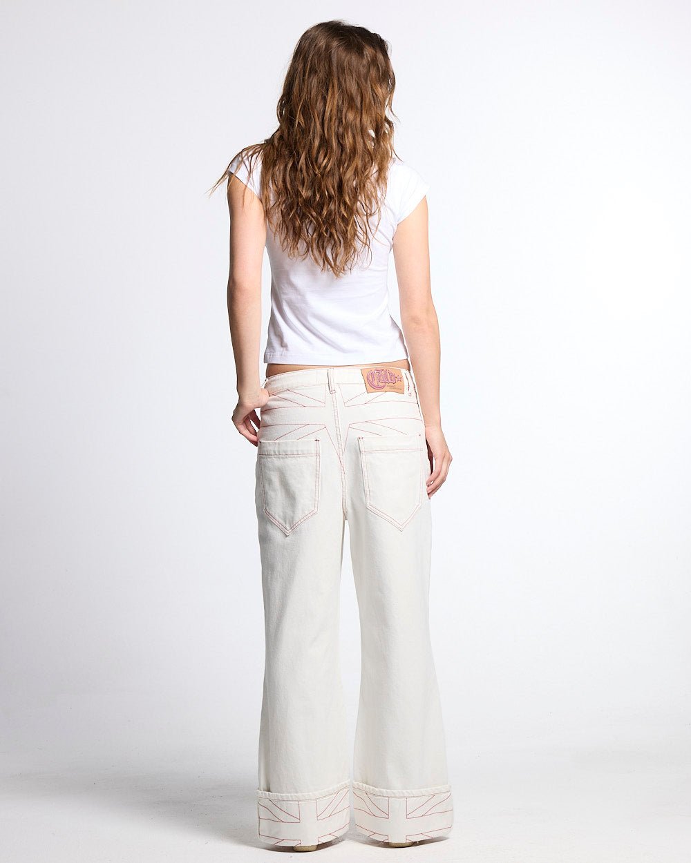 TOP BOY PANTS WHITE - white contrast stitch denim pants, back view on female model - Cold Culture #woman