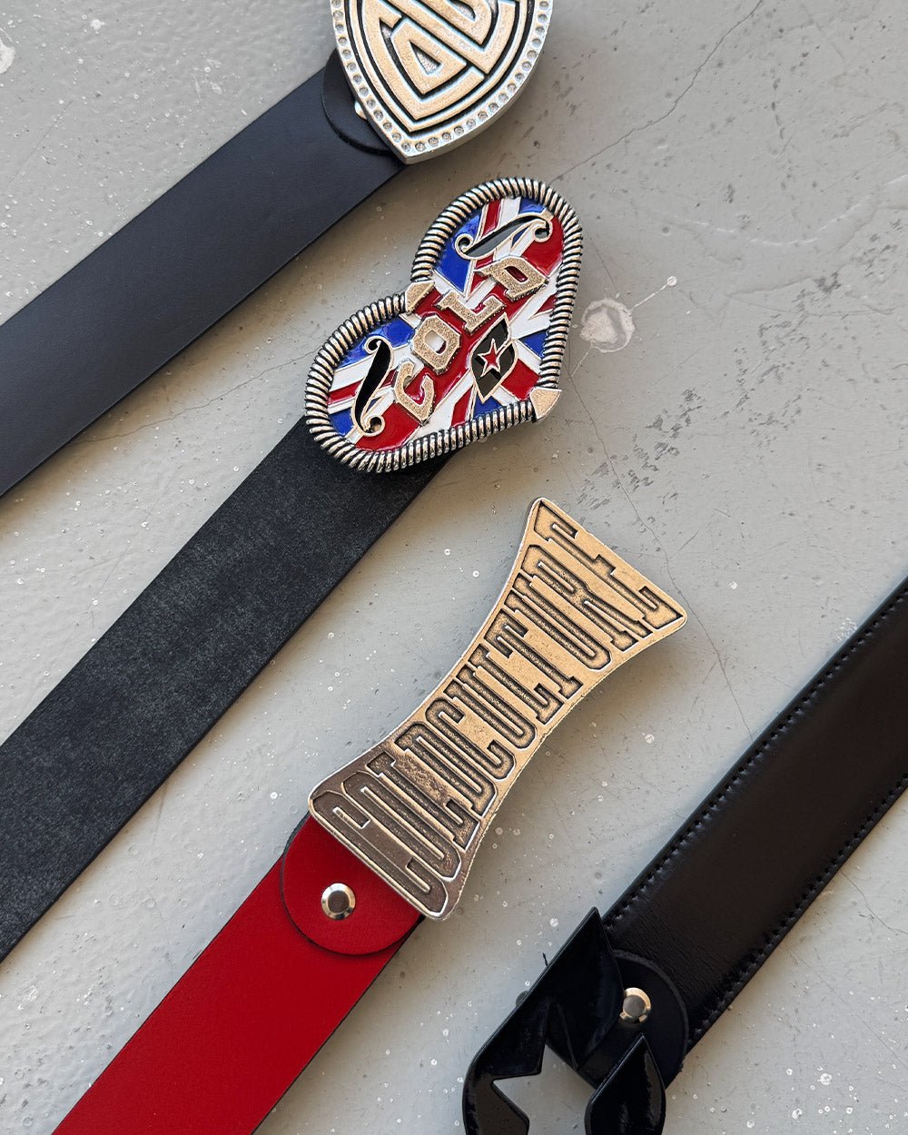 TRIANGLE BLING BLING LEATHER BELT BLACK - black leather belt, flat lay with matching pieces - Cold Culture