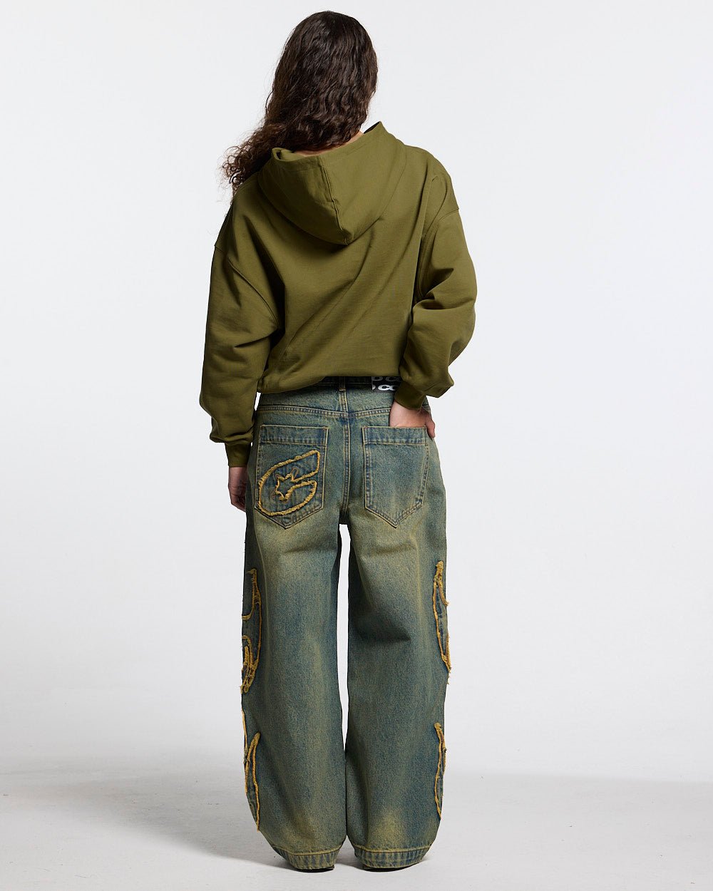 TRIBAL DISTRESSED V2 PANTS GREEN WASHED DENIM - distressed green denim pants, back view on female model - Cold Culture #woman