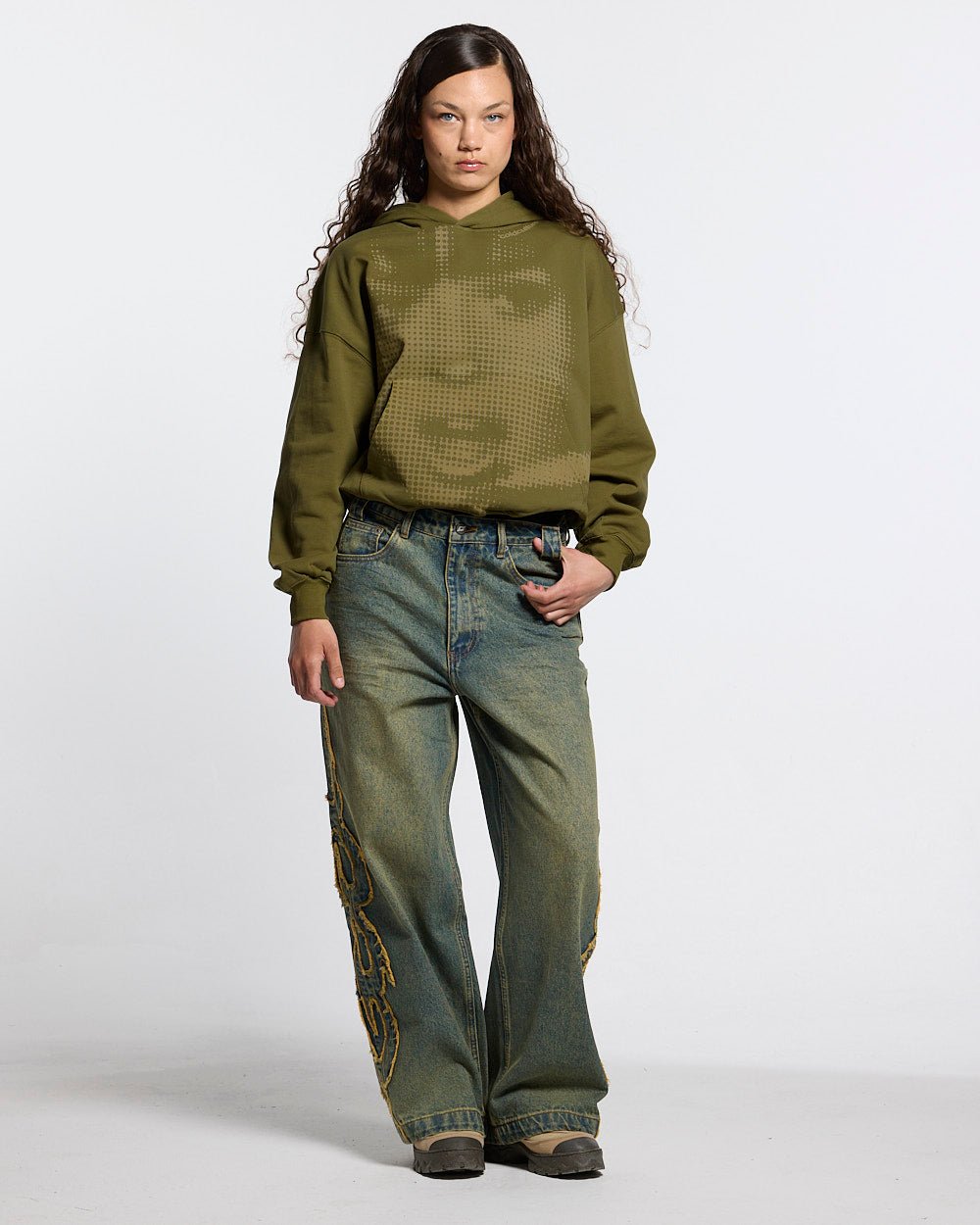 TRIBAL DISTRESSED V2 PANTS GREEN WASHED DENIM - distressed green denim pants, front view on female model - Cold Culture #woman