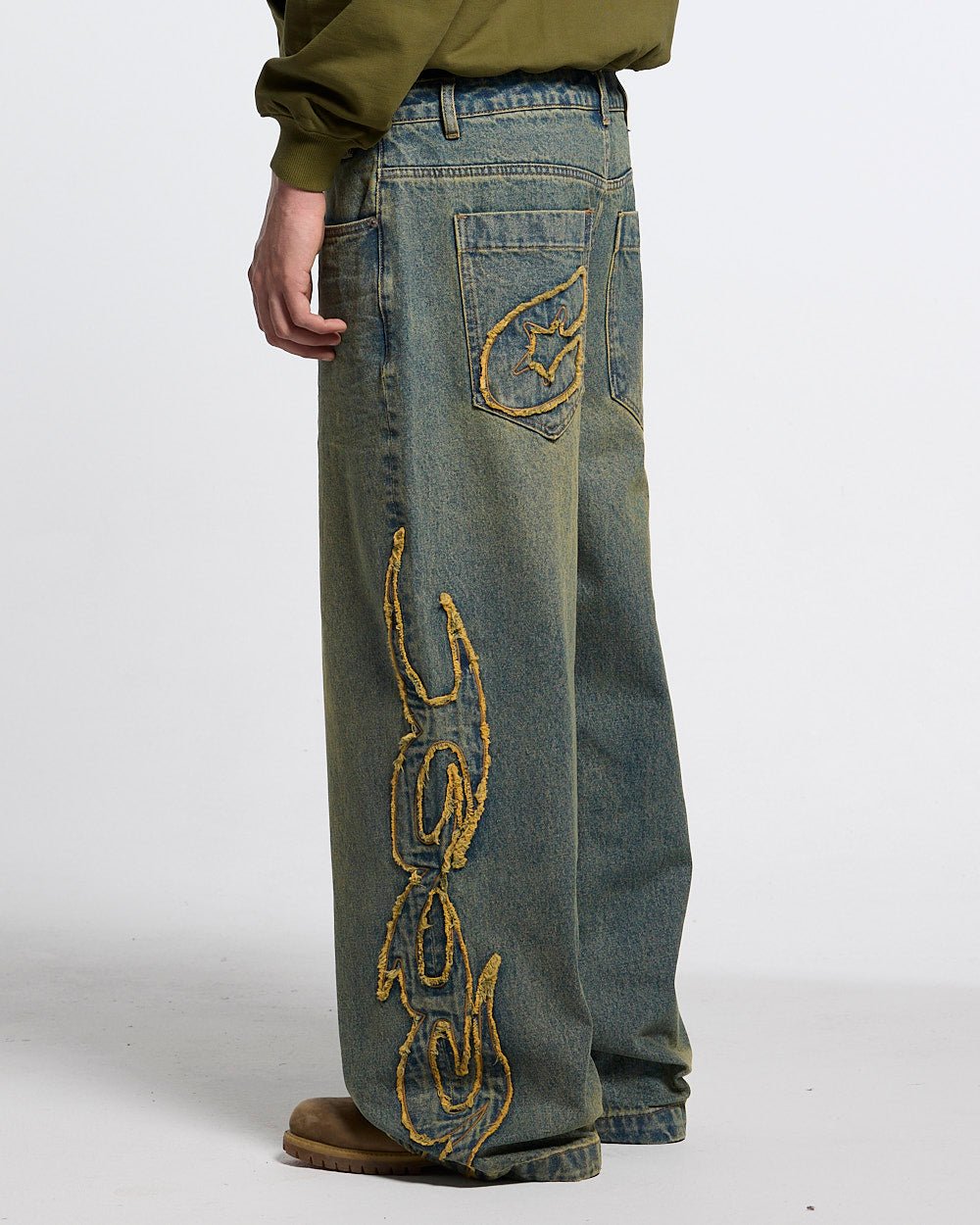 TRIBAL DISTRESSED V2 PANTS GREEN WASHED DENIM - distressed green denim pants, back view on male model - Cold Culture