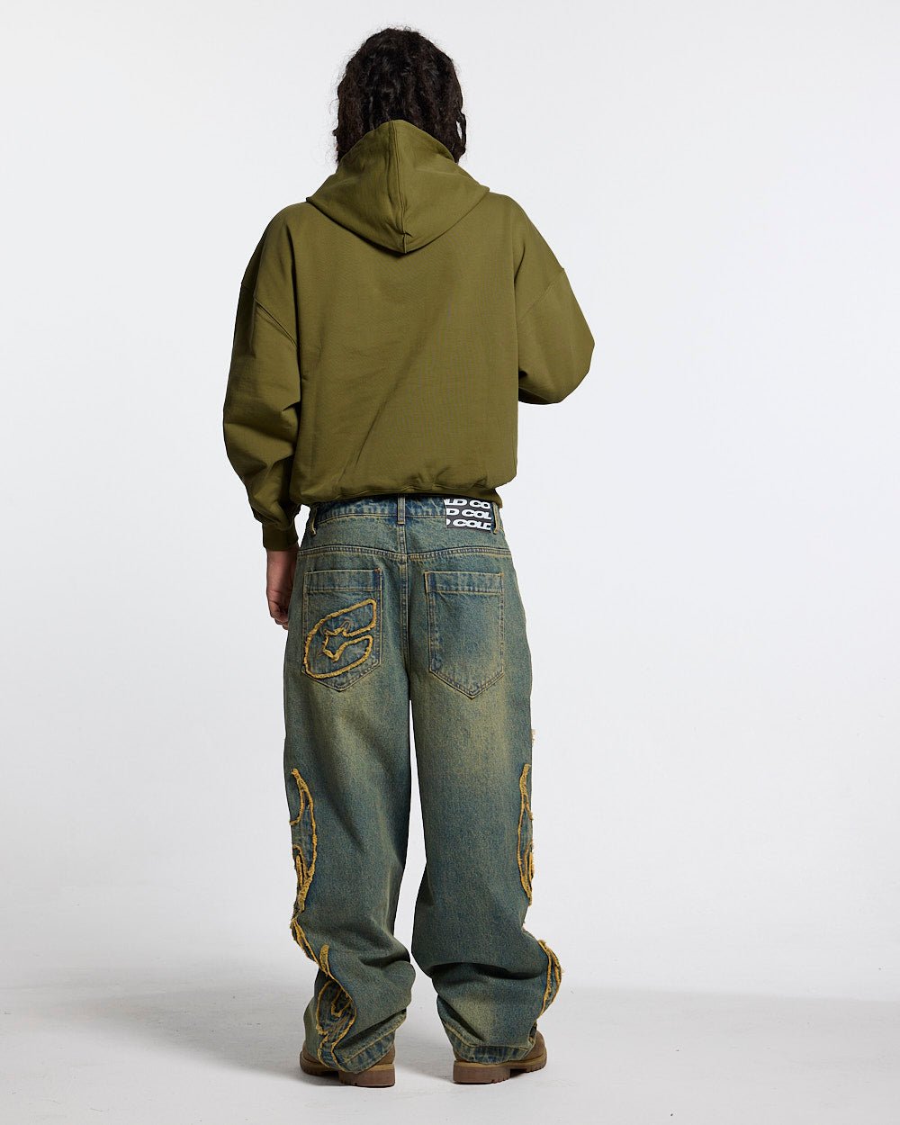 TRIBAL DISTRESSED V2 PANTS GREEN WASHED DENIM - distressed green denim pants, back view on male model - Cold Culture #man