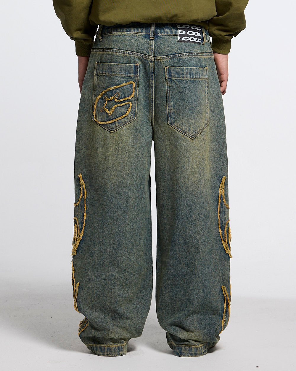 TRIBAL DISTRESSED V2 PANTS GREEN WASHED DENIM - distressed green denim pants, back view on male model - Cold Culture