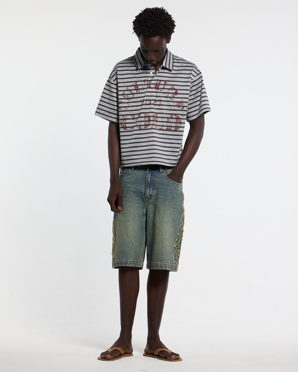 TRIBAL DISTRESSED V2 SHORTS GREEN - green washed denim shorts, front view on male model - Cold Culture #man