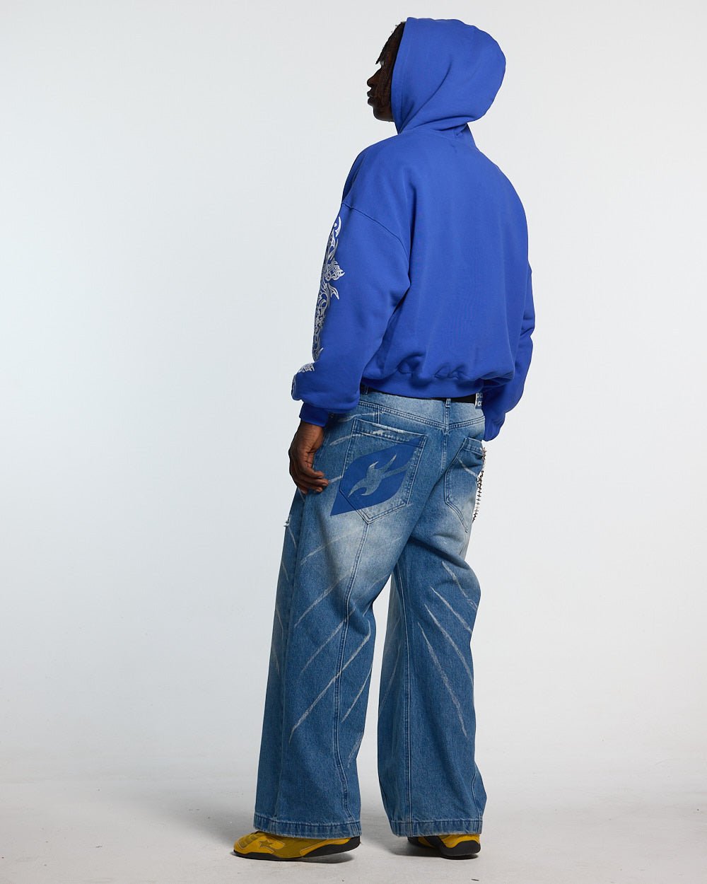 TRIBAL HOODIE BLUE - blue tribal print hoodie, back view on male model - Cold Culture