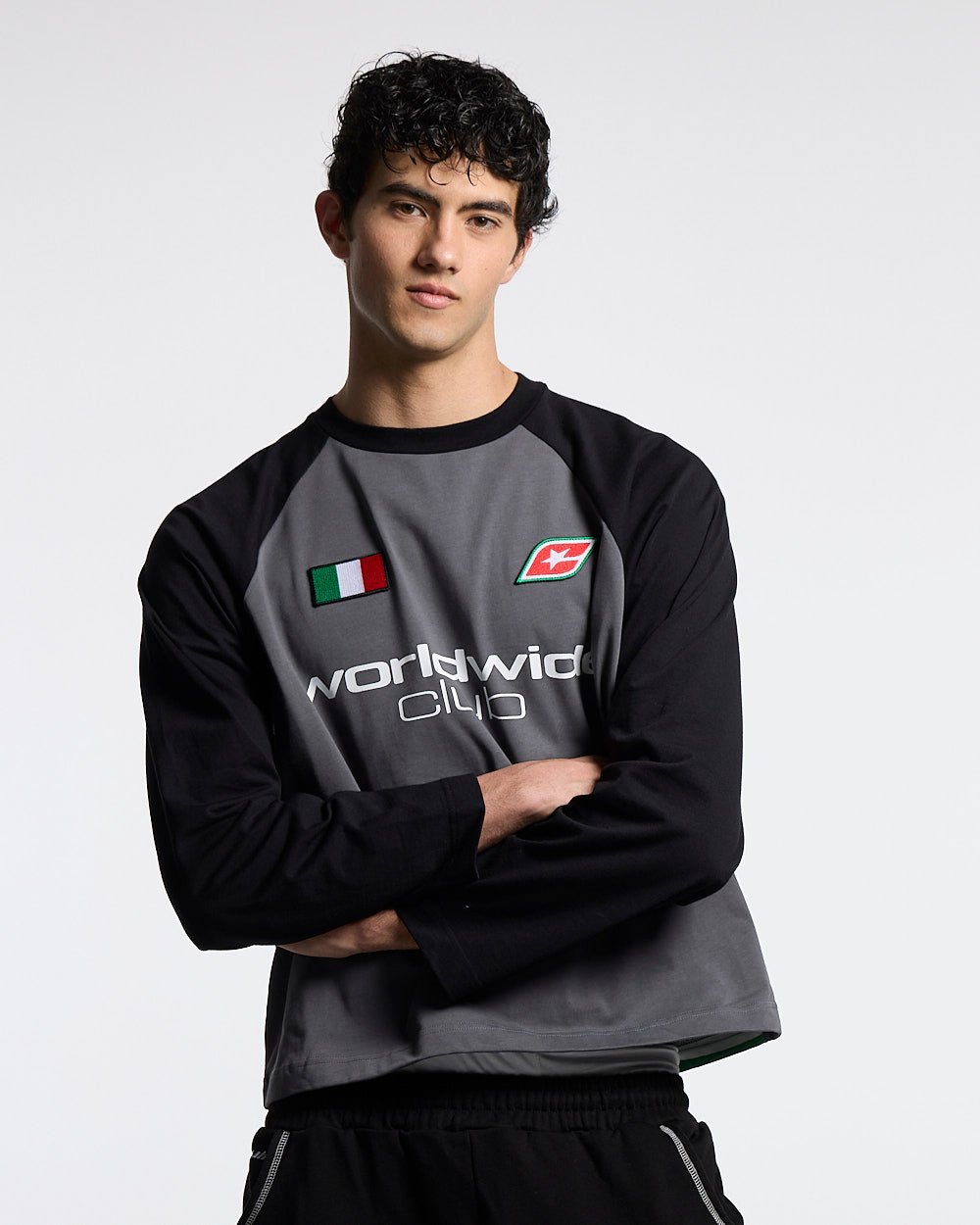 TRICOLORE LONGSLEEVE BLACK - black football-style longsleeve tee, front view on male model - Cold Culture #man