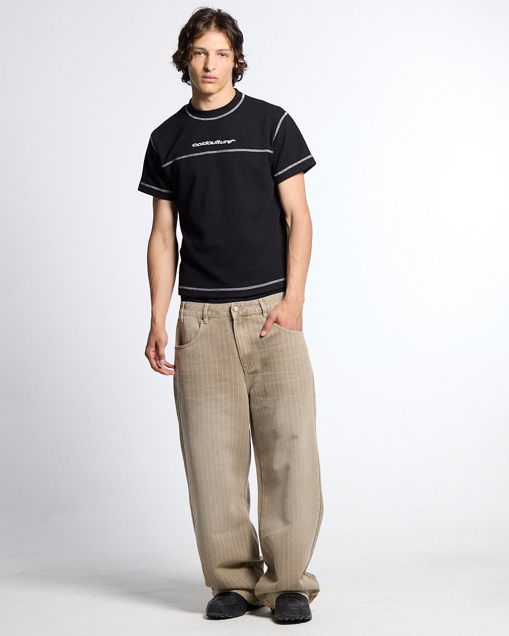 UNDERSKIN TEE BLACK - black contrast stitch tee, front view on male model - Cold Culture #man