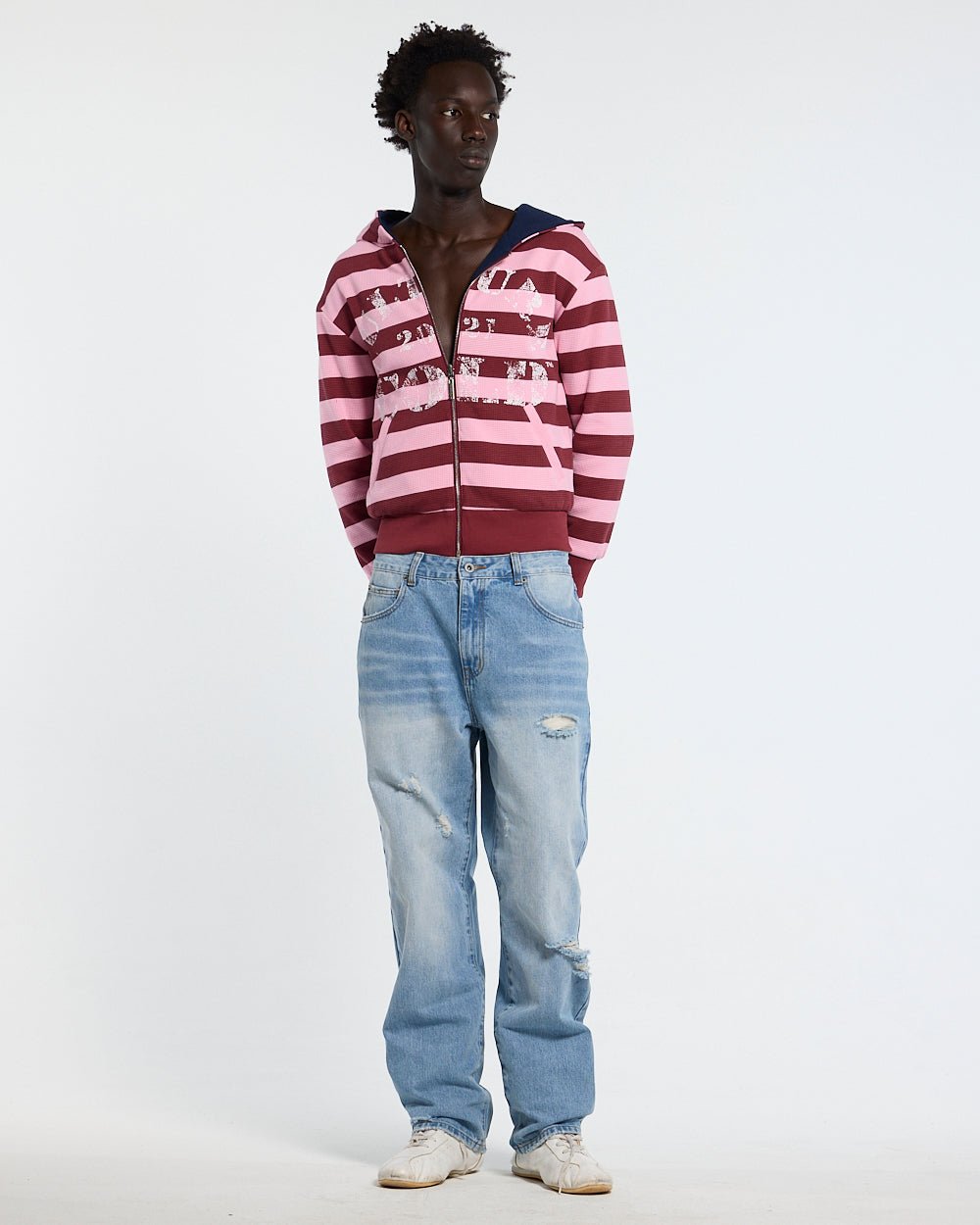 UNTRUE WAFFLE REVERSIBLE ZIP HOODIE PINK - pink striped reversible zip-up hoodie, front view on male model - Cold Culture #man