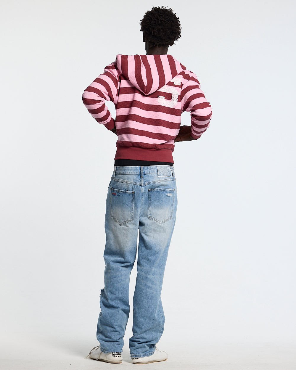 UNTRUE WAFFLE REVERSIBLE ZIP HOODIE PINK - pink striped reversible zip-up hoodie, back view on male model - Cold Culture #man
