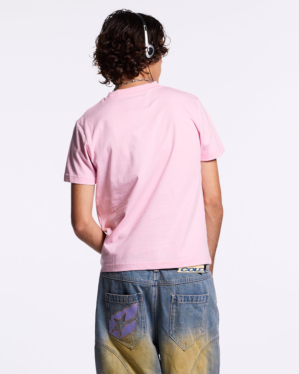 URBAN LEGACY TEE BABY PINK - baby pink graphic print tee, back view on male model - Cold Culture #man