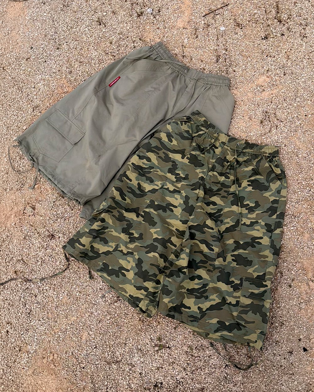 UTILITARY CAPRI PARACHUTE CAMO - camo cargo capri shorts, flat lay with matching pieces - Cold Culture