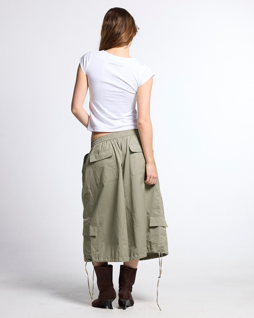 UTILITARY CAPRI PARACHUTE CREAM - khaki cargo capri shorts, back view on female model - Cold Culture #woman