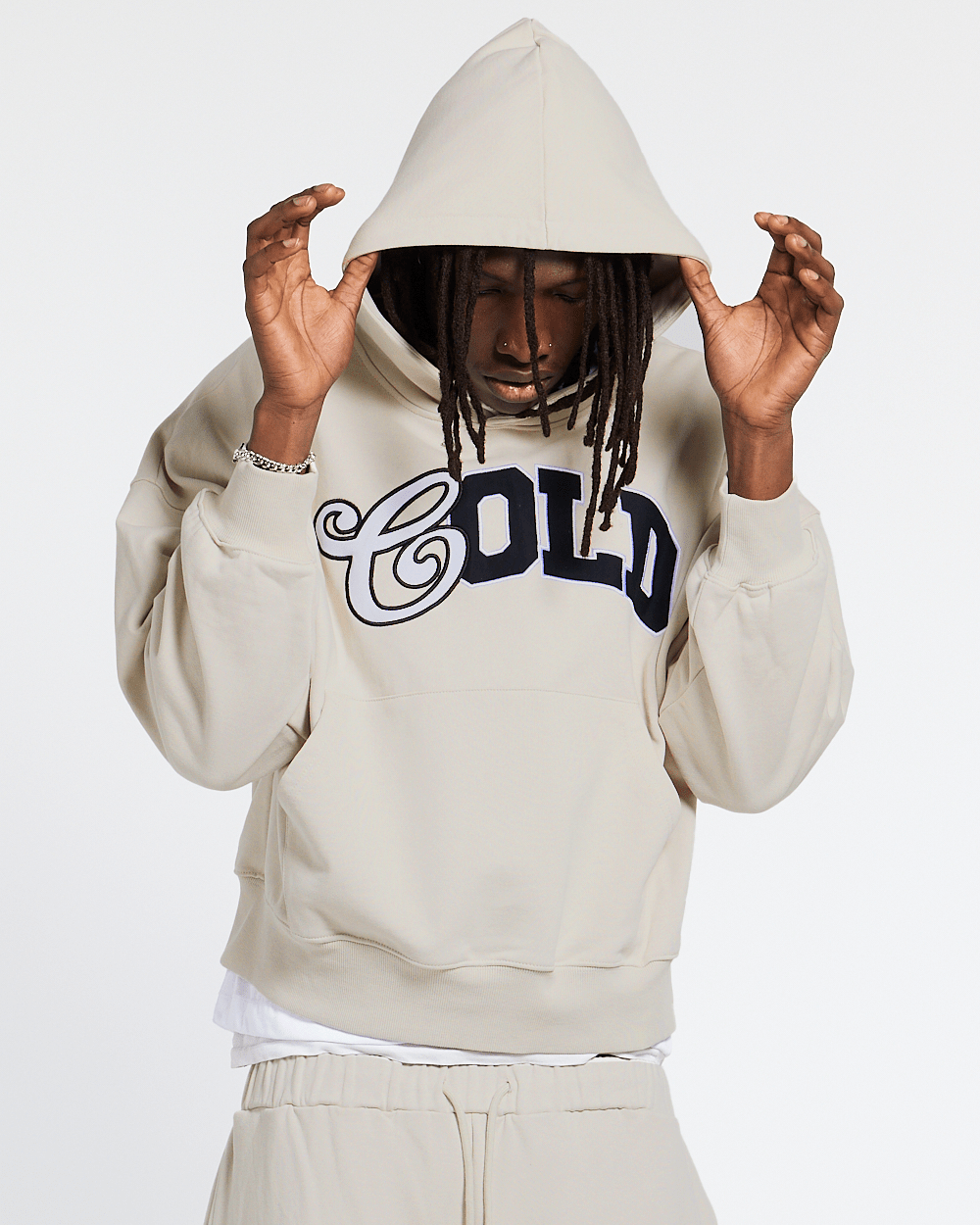 VARSITY HOODIE IVORY GREY - ivory varsity print hoodie, front view on male model - Cold Culture #man