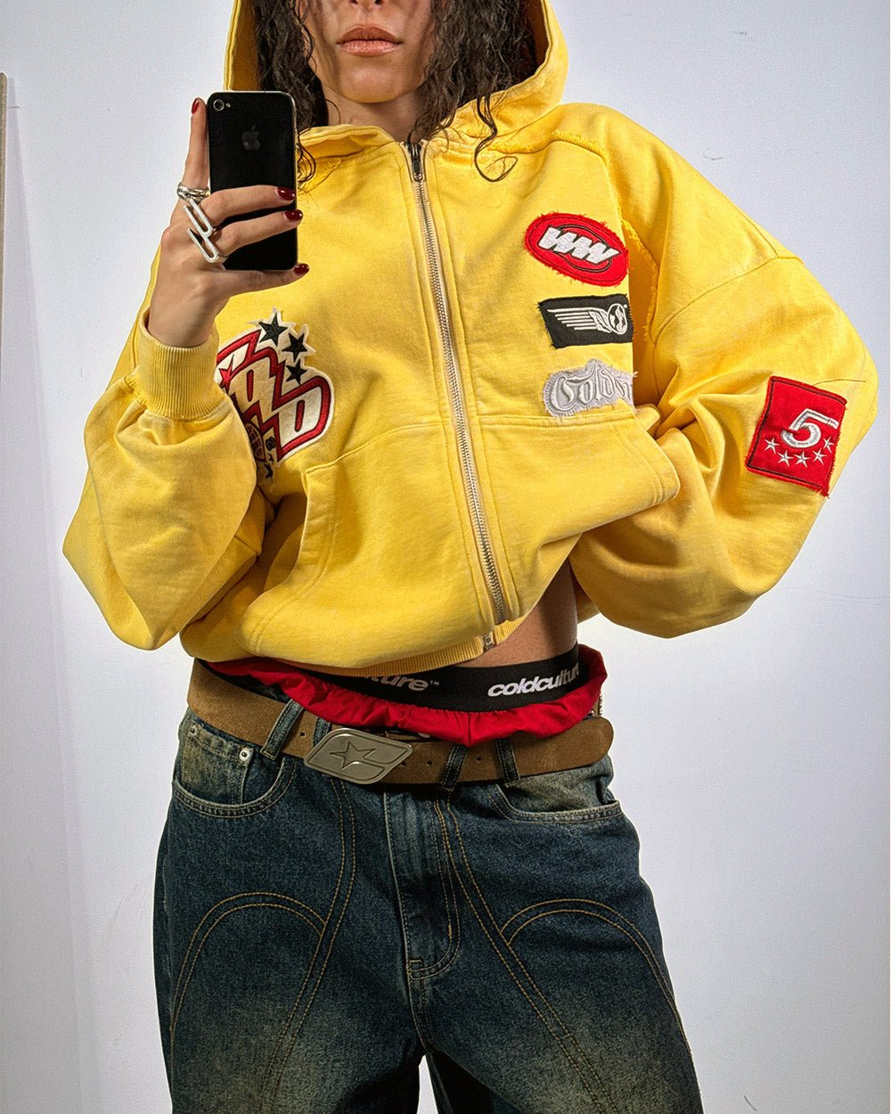 WALKER ZIP HOODIE YELLOW - yellow zip-up hoodie with patches, on model close-up - Cold Culture