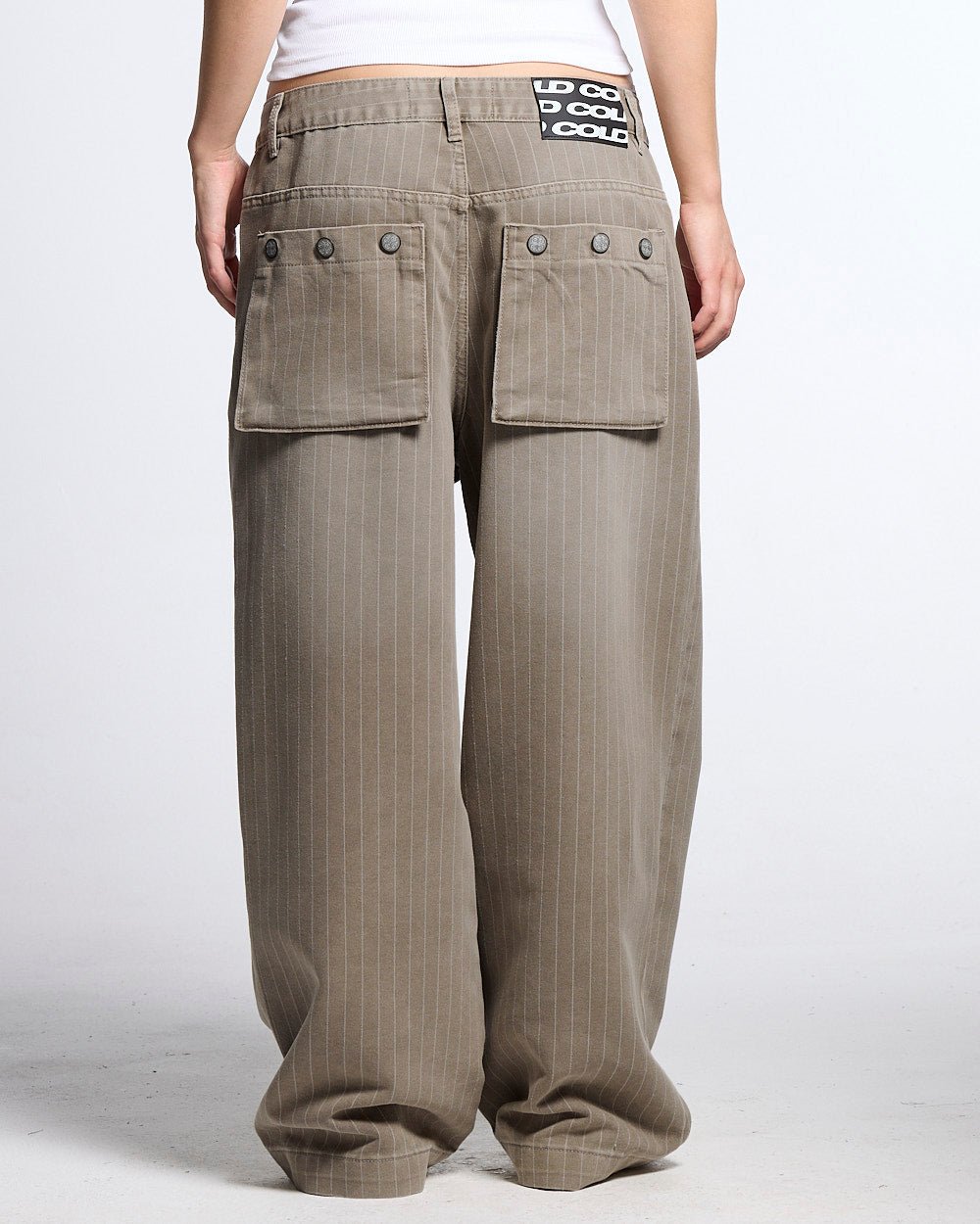 WASHED CASINO V1 PANTS BEIGE - beige pinstripe washed pants, back view on female model - Cold Culture