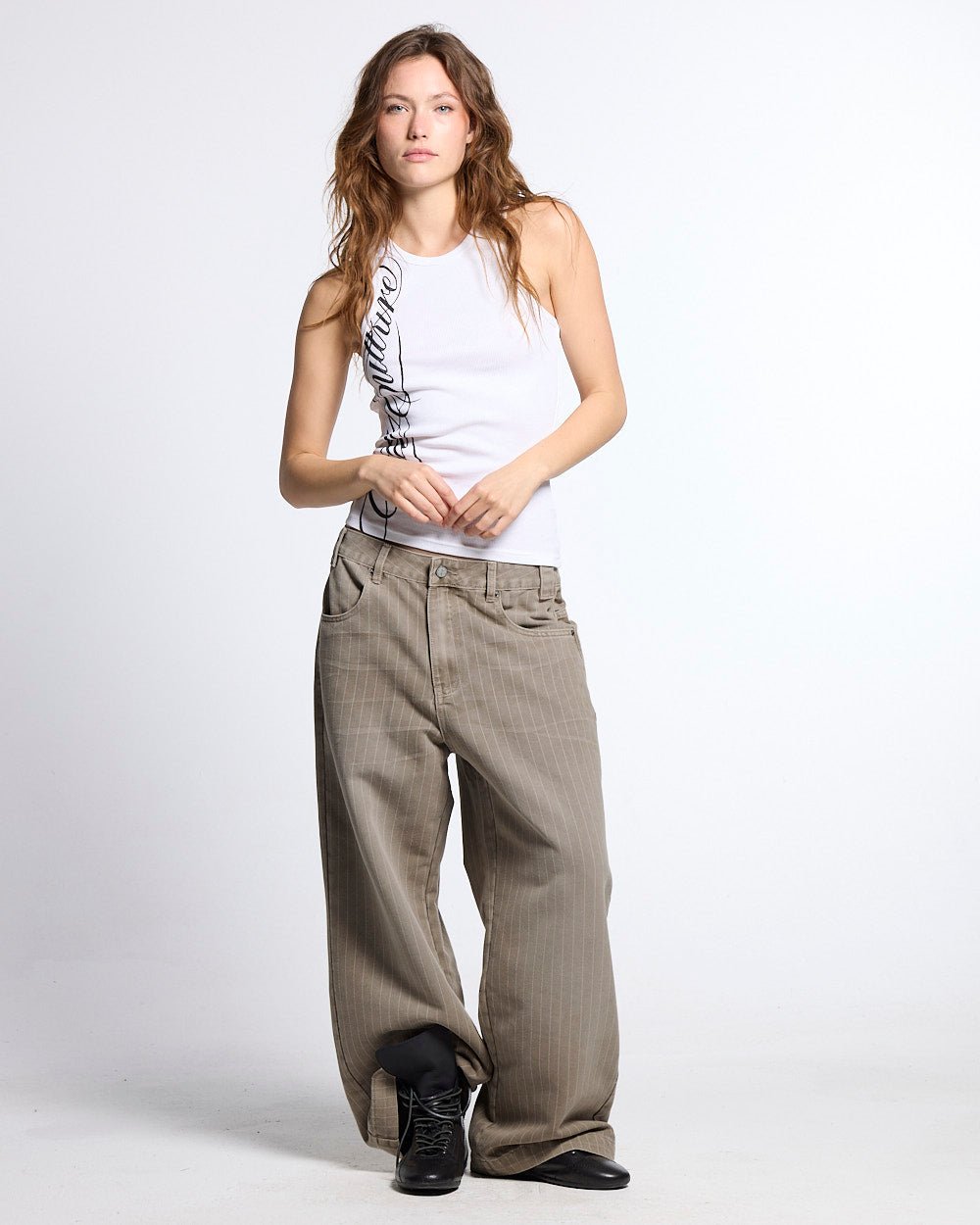 WASHED CASINO V1 PANTS BEIGE - beige pinstripe washed pants, front view on female model - Cold Culture #woman
