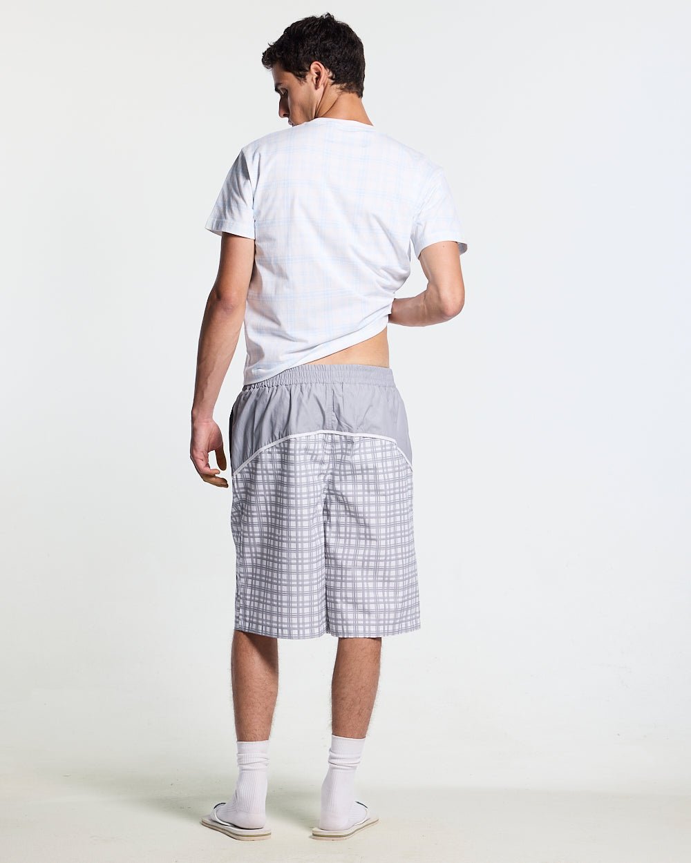 WAVE SWIMSHORTS GREY - grey checked swim shorts, back view on male model - Cold Culture #man
