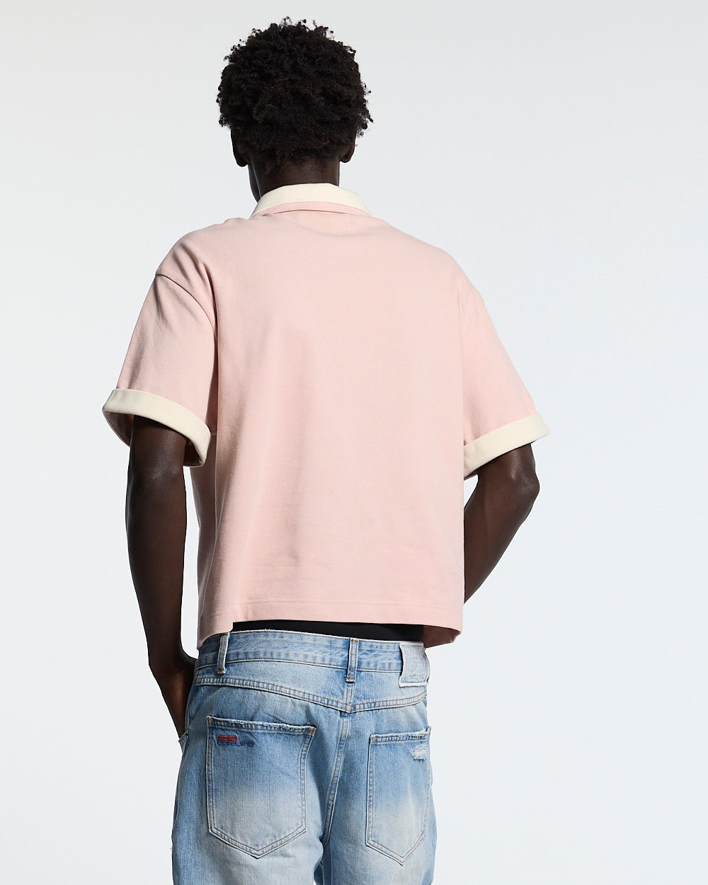 WHIP POLO PINK - pink oversized polo shirt, back view on male model - Cold Culture