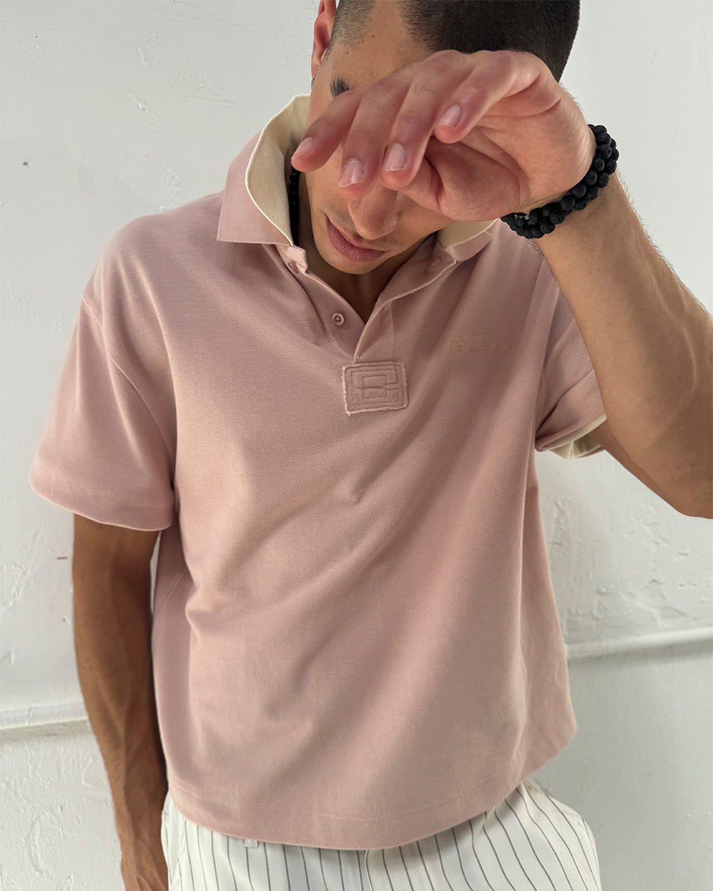 WHIP POLO PINK - pink oversized polo shirt, on model close-up - Cold Culture