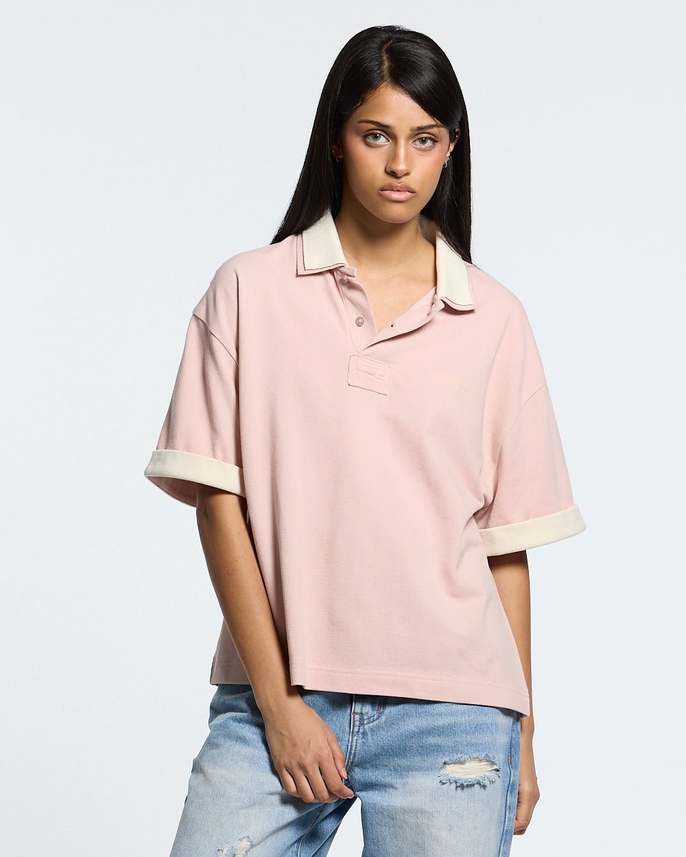 WHIP POLO PINK - pink oversized polo shirt, front view on female model - Cold Culture #woman