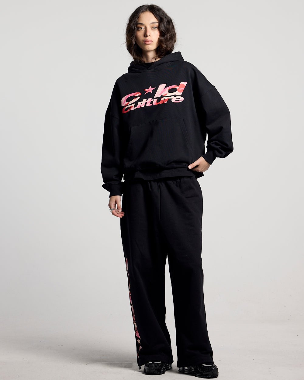 WILD CAMO HOODIE BLACK - black graphic print hoodie, front view on female model - Cold Culture #woman