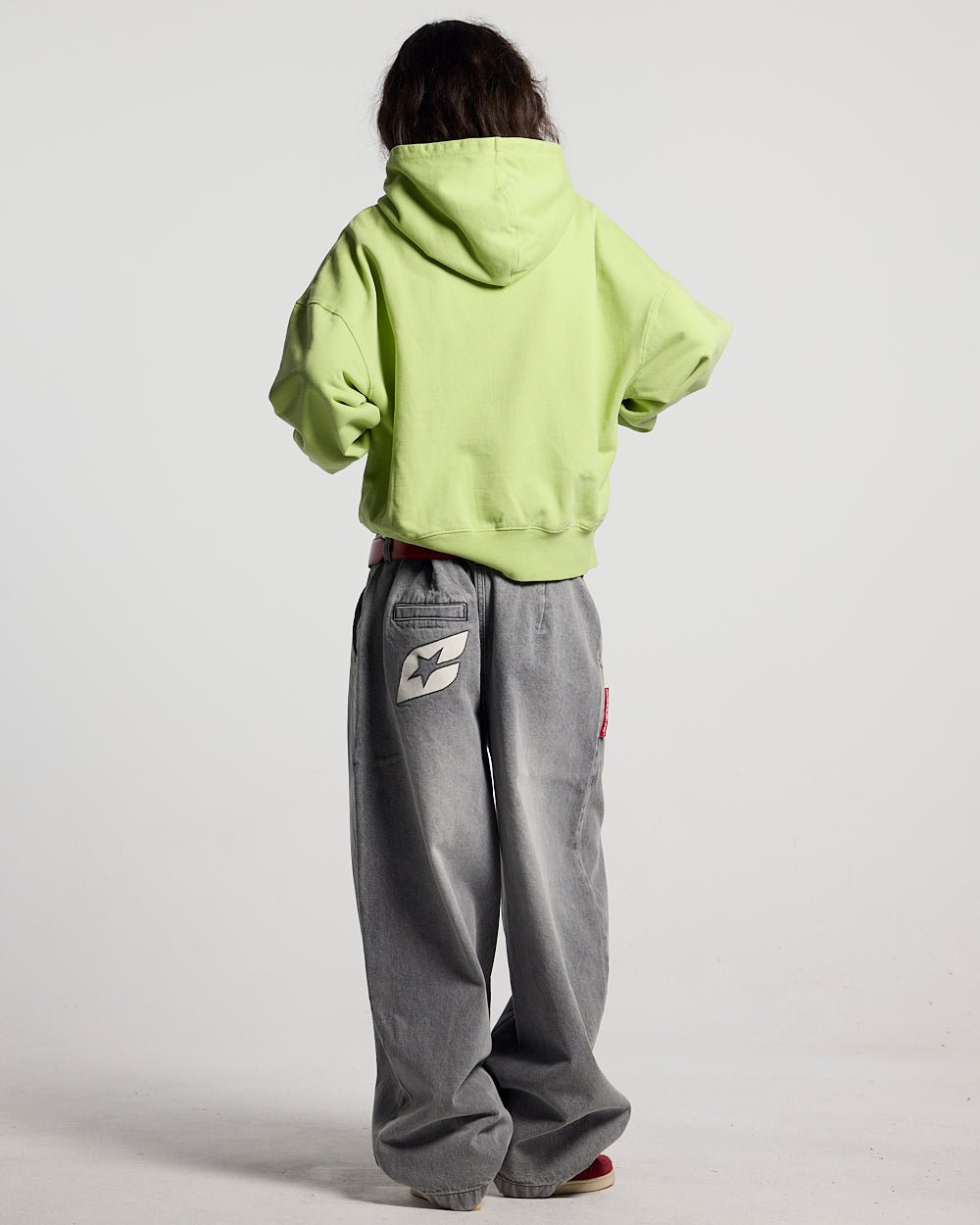 WILD HOODIE GREEN - lime green graphic print hoodie, back view on female model - Cold Culture #woman