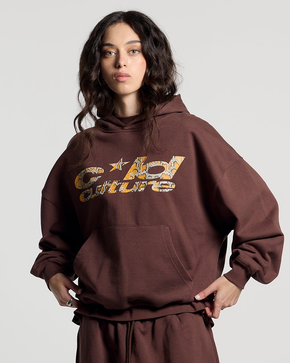 WILD SNAKE HOODIE BROWN - brown graphic print hoodie, front view on female model - Cold Culture #woman