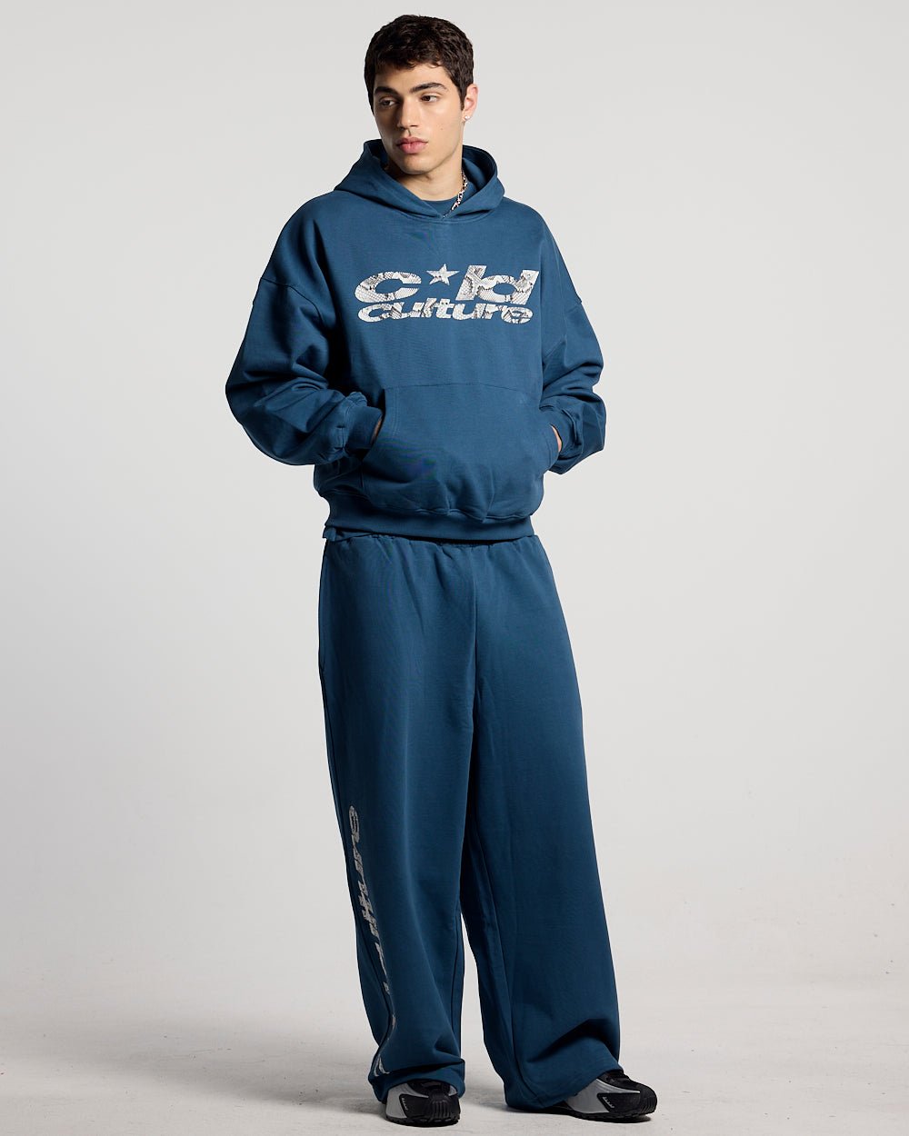 WILD SNAKE SWEATPANTS NAVY BLUE - navy blue baggy sweatpants, front view on male model - Cold Culture #man