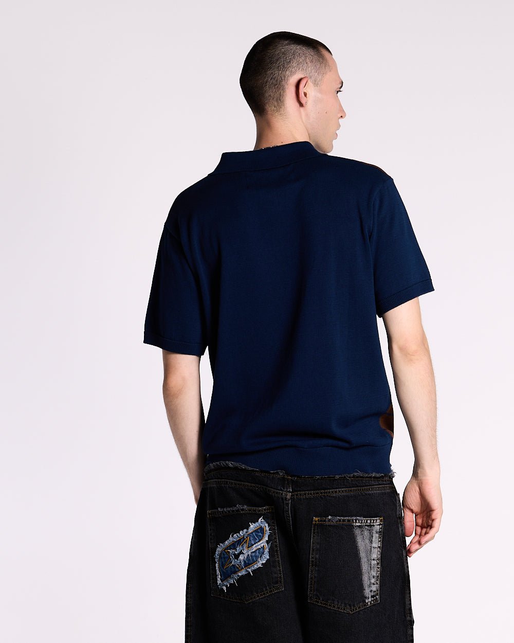 WINNERS V5 POLO BROWN AND BLUE - brown and blue striped knitted polo, back view on male model - Cold Culture #man