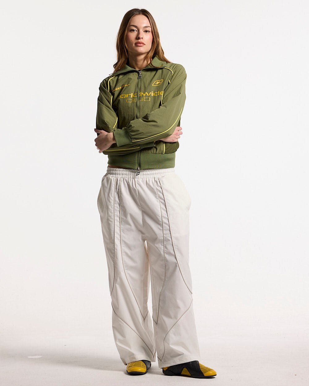 WW CLUB JACKET GREEN - olive green track jacket, front view on female model - Cold Culture #woman