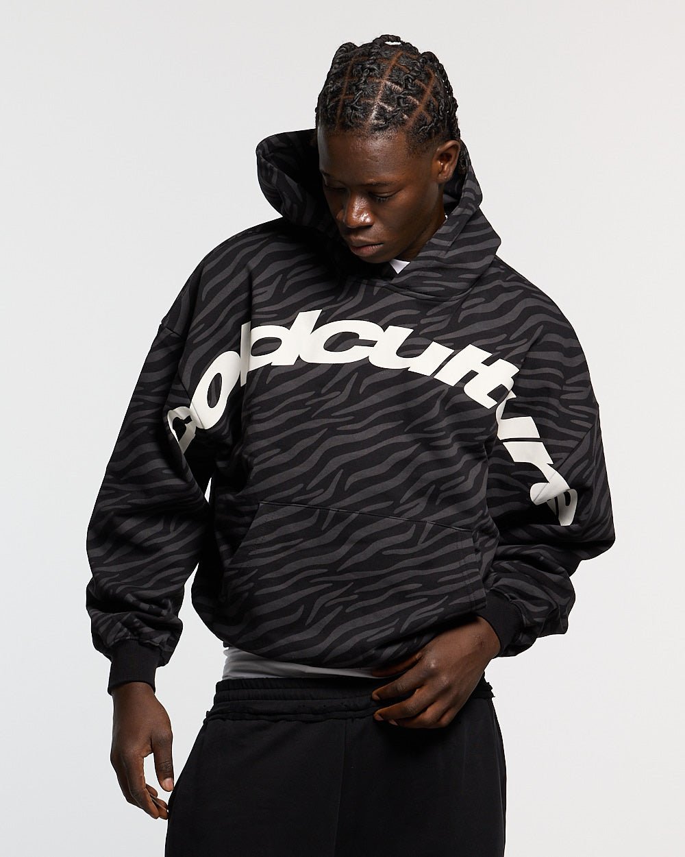 ZEBRA HOODIE BLACK - black zebra print hoodie, front view on male model - Cold Culture #man