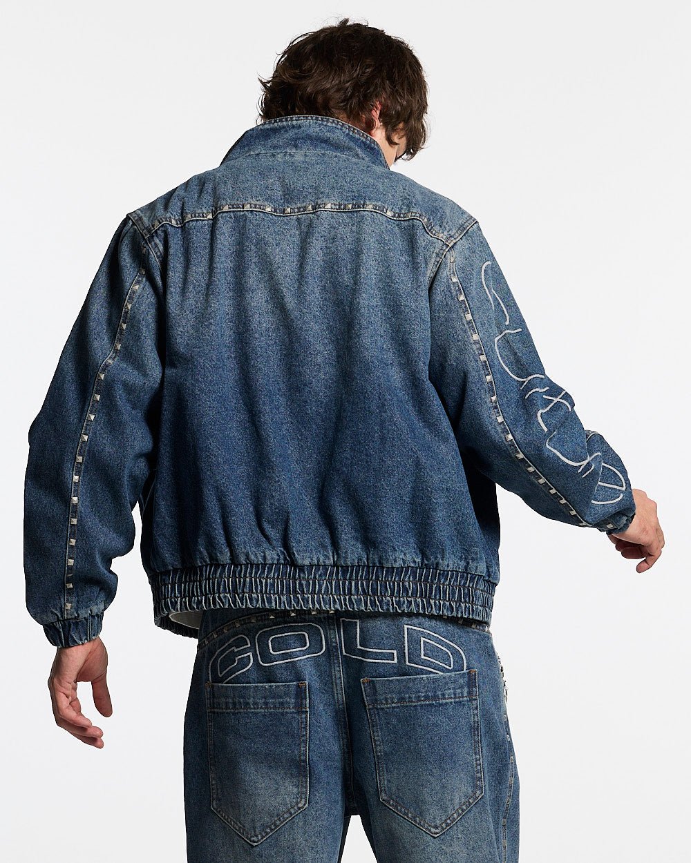 2010 DENIM JACKET BLUE DENIM - blue studded denim jacket, back view on male model - Cold Culture #man