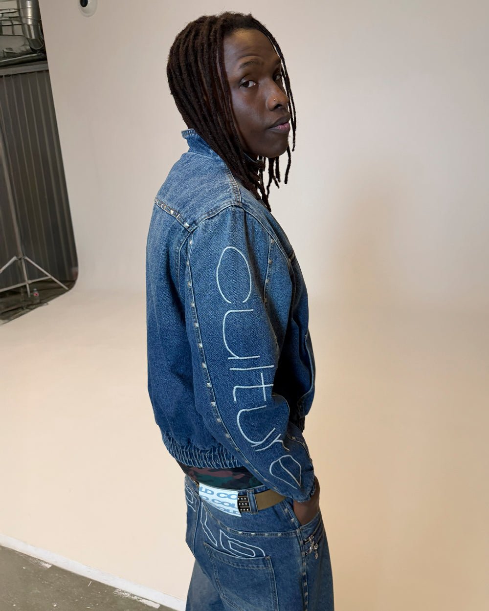 2010 DENIM JACKET BLUE DENIM - blue studded denim jacket, side view - Cold Culture