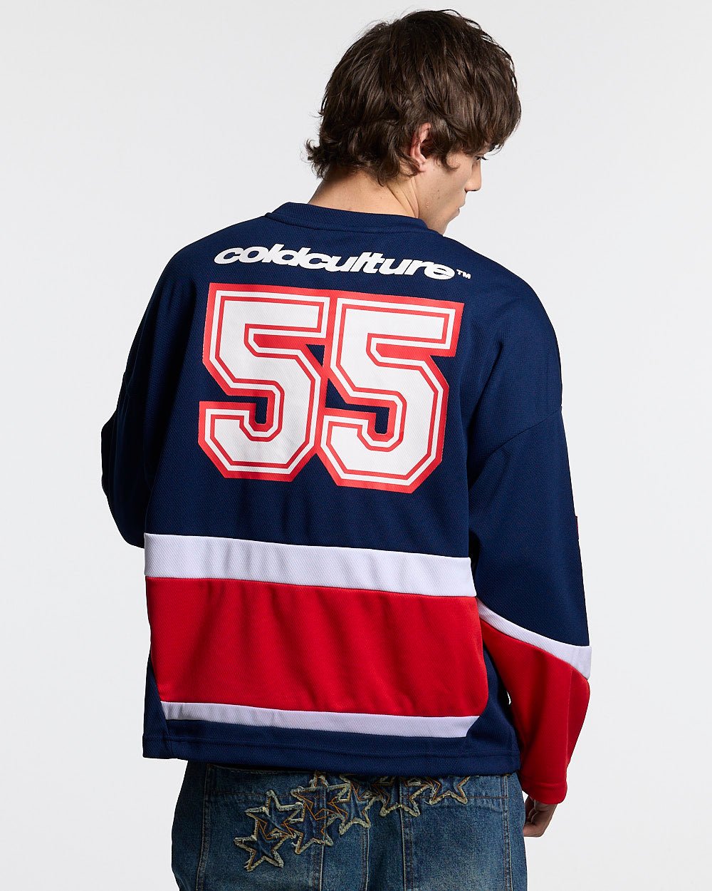 55 VIRAL LONGSLEEVE BLUE - navy and red longsleeve jersey, back view on male model - Cold Culture #man