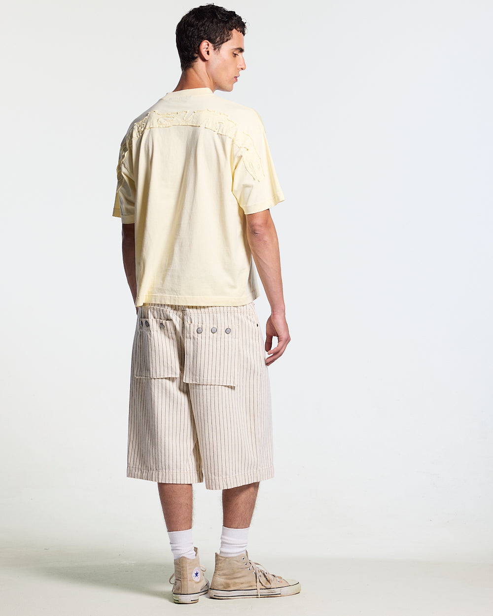 DISTRESS CURVED TEE YELLOW - pale yellow distressed tee, back view on male model - Cold Culture #man