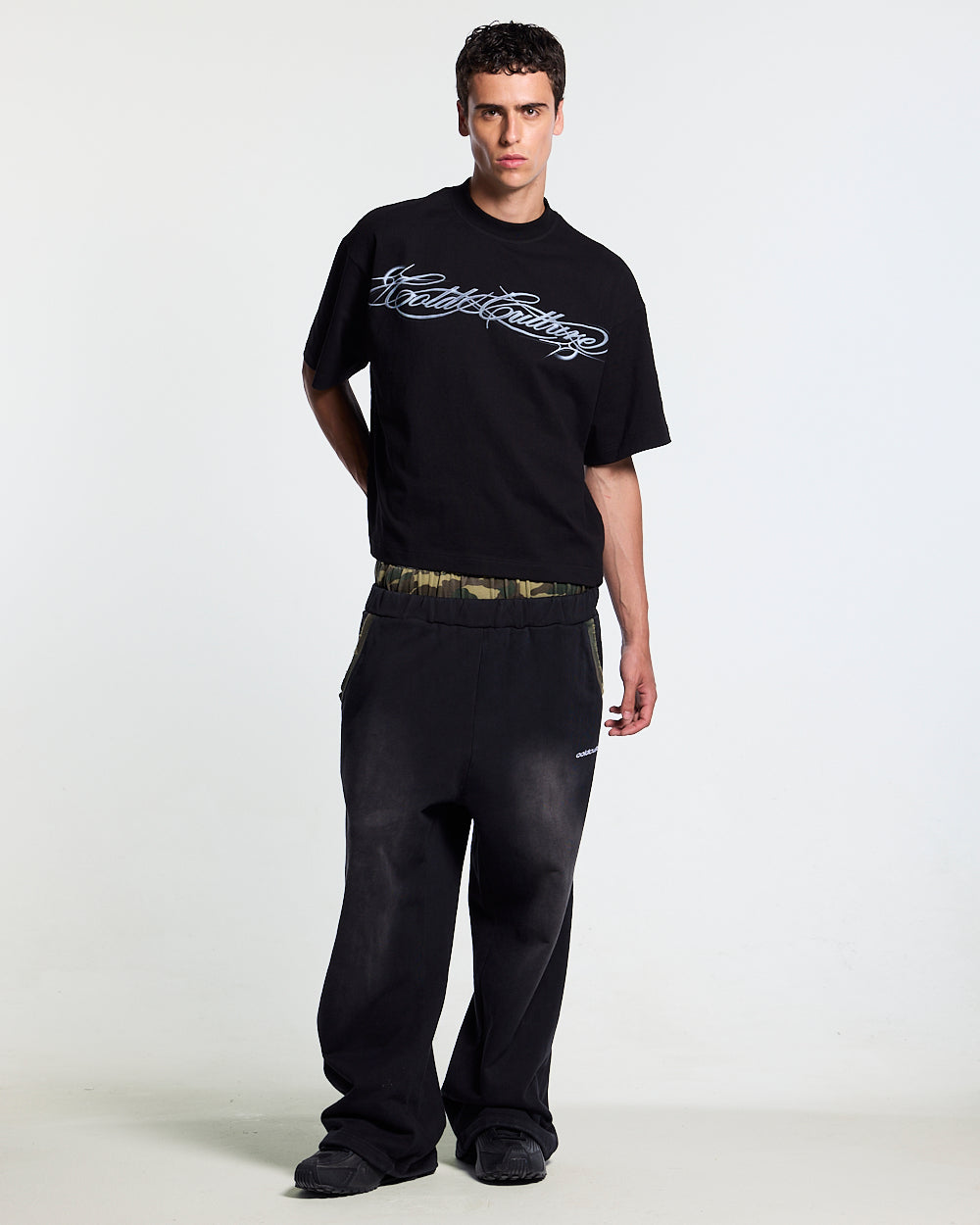 METAL SCRIPT TEE BLACK - black script print tee, front view on male model - Cold Culture #man