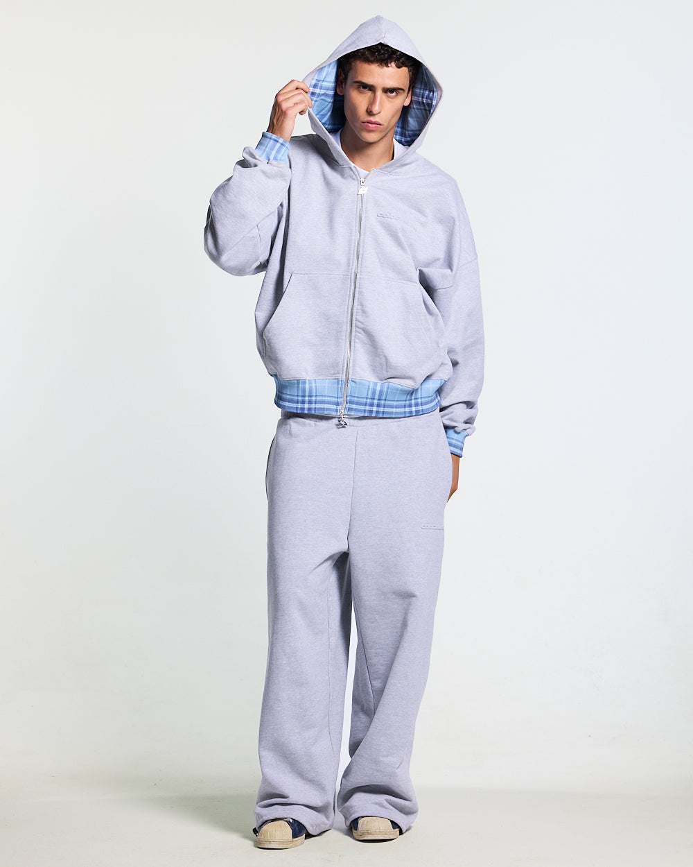 TAKE A PEAK ZIP HOODIE HEATHER GREY - grey zip-up hoodie with plaid trim, front view on male model - Cold Culture #man