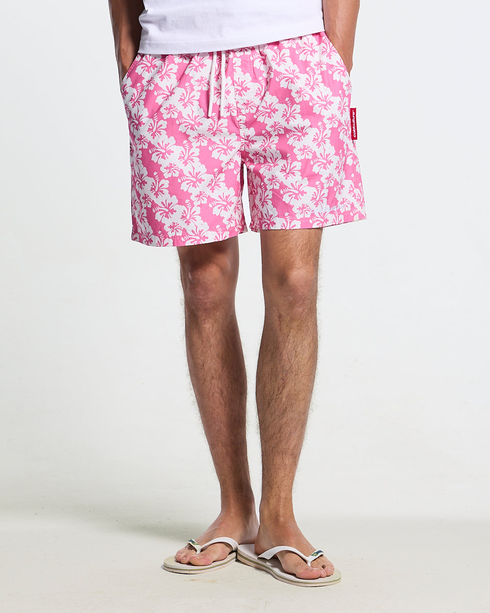 ALOHA SWIMSHORTS PINK - pink floral swim shorts, worn detail - Cold Culture