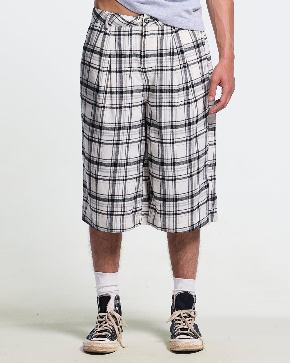 DINING CHECK JORTS BLACK - black and white checkered shorts, front view on male model - Cold Culture