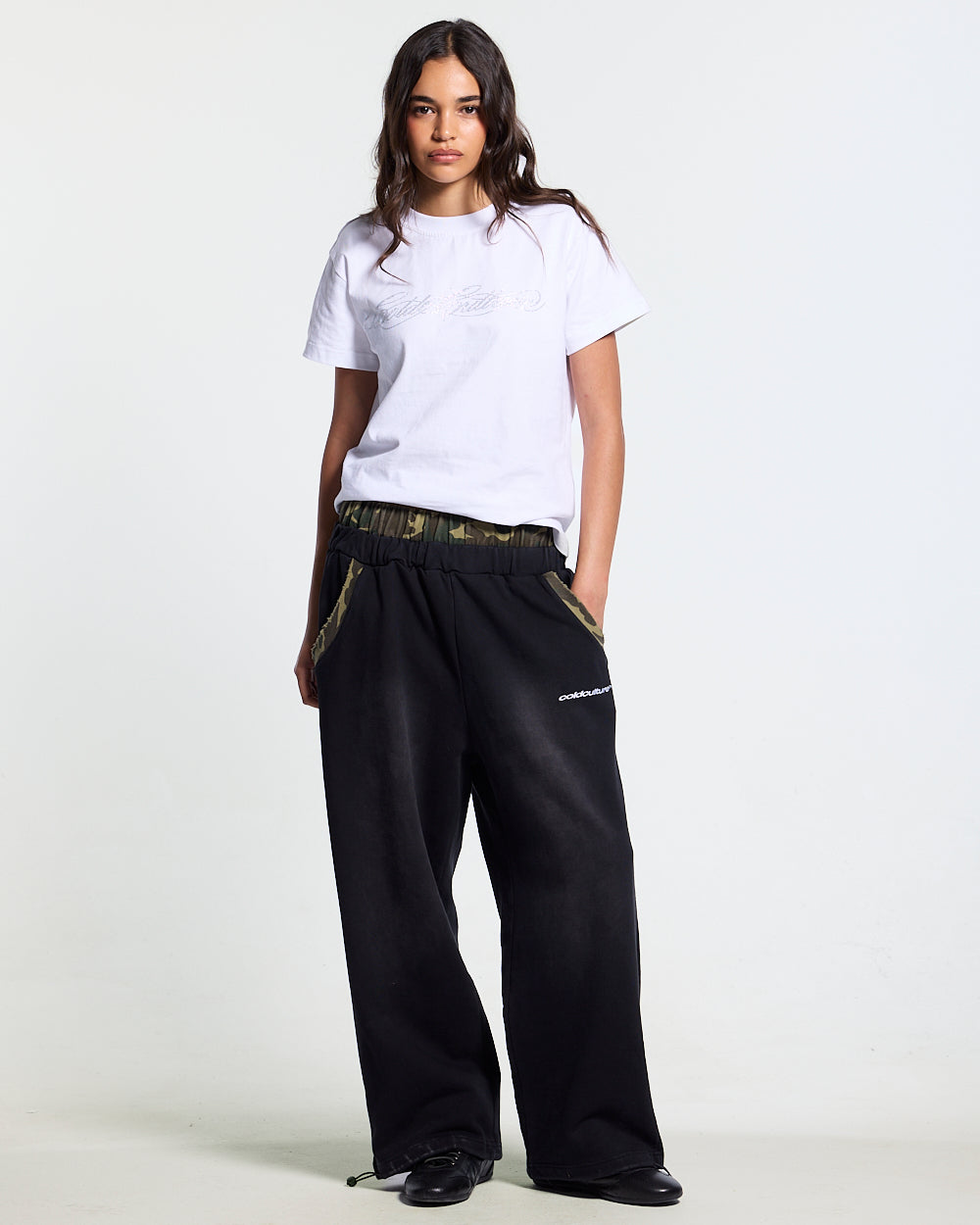 BLACK OPS SWEATPANTS BLACK - washed black sweatpants, front view on female model - Cold Culture #woman