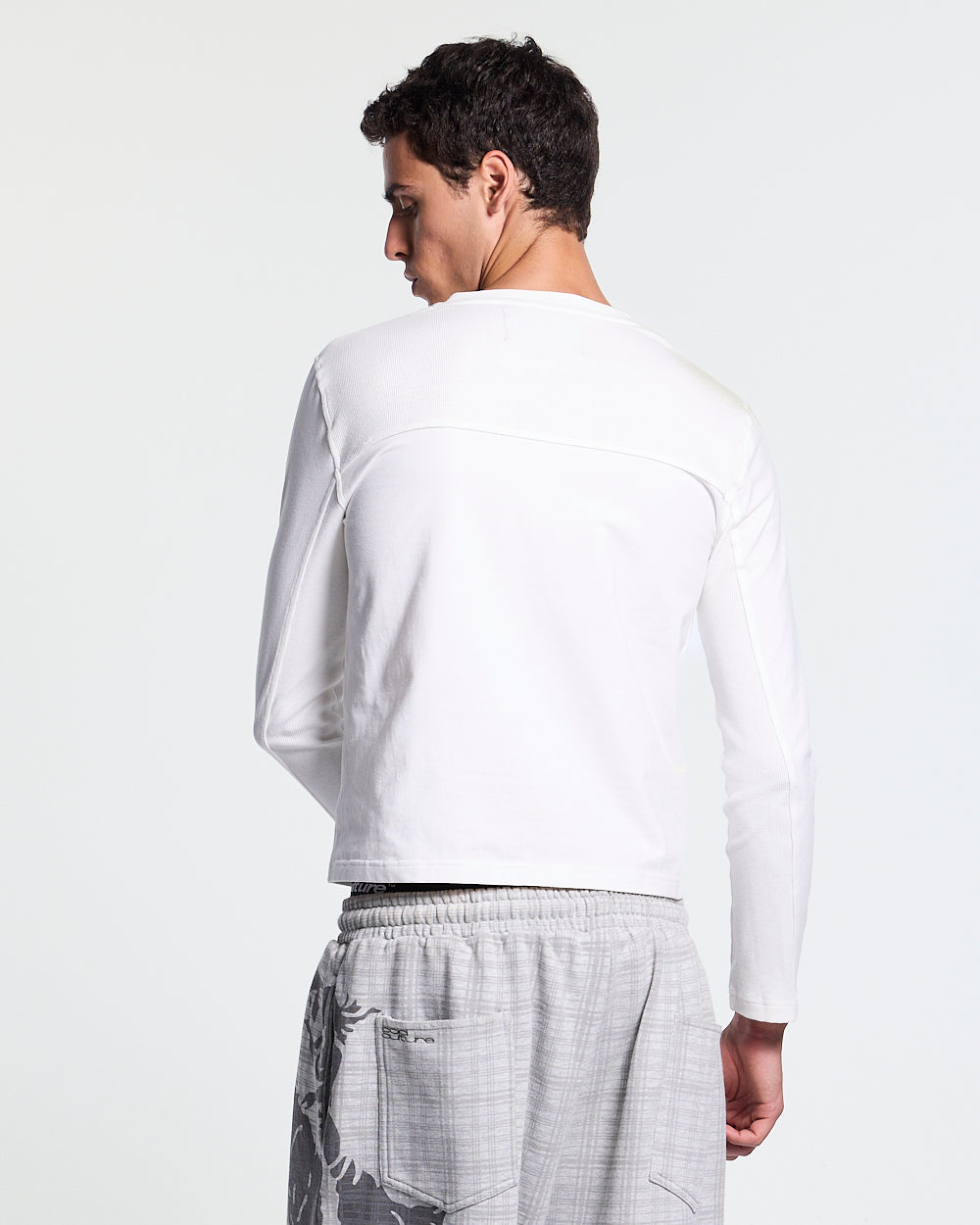 IDENTITY LONGSLEEVE WHITE - white embroidered longsleeve tee, back view on male model - Cold Culture #man