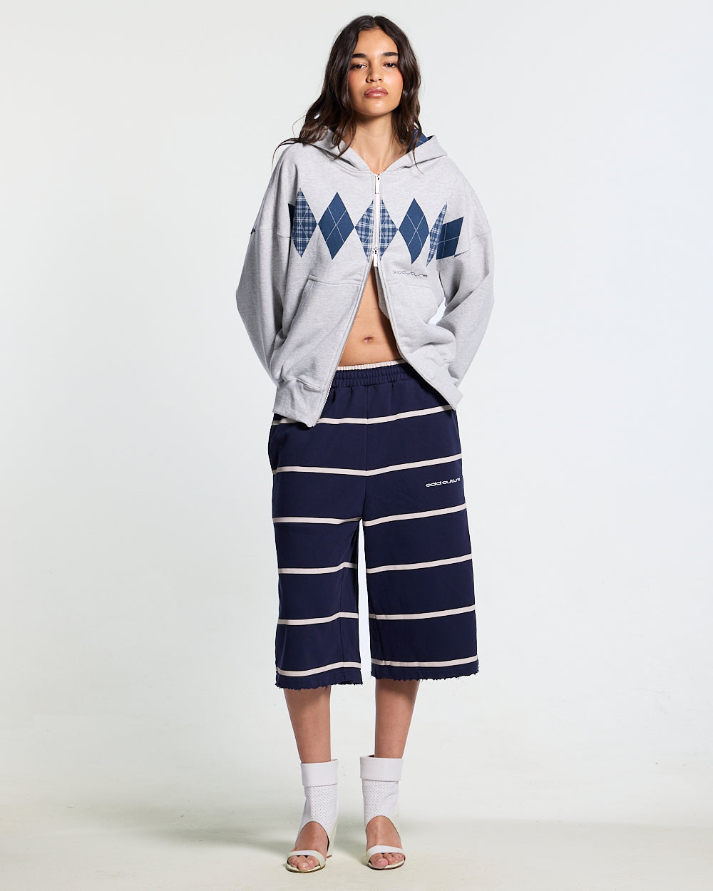 STALLION SHORT SWEATPANTS NAVY - navy striped sweat shorts, front view on female model - Cold Culture #woman