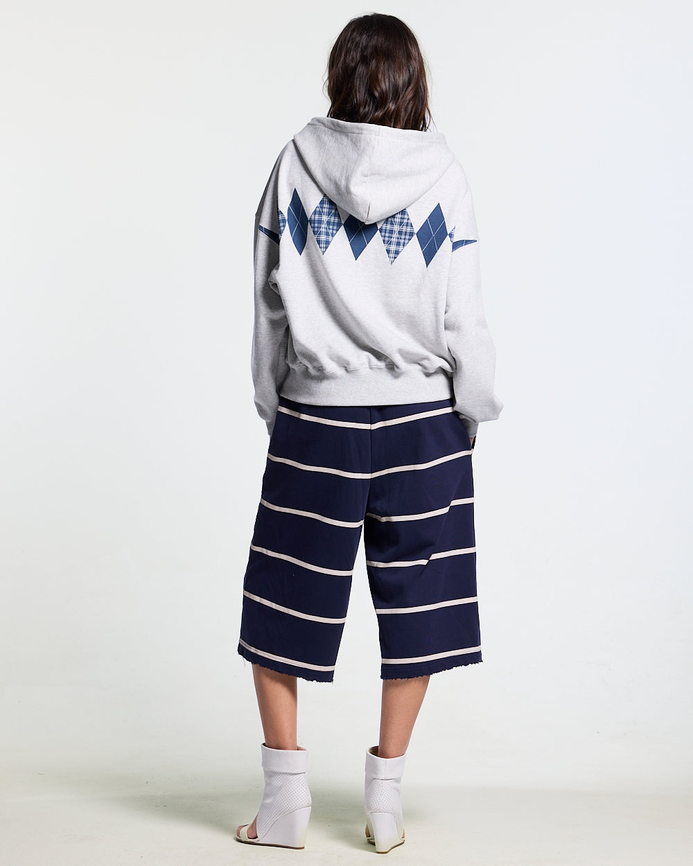 STALLION SHORT SWEATPANTS NAVY - navy striped sweat shorts, back view on female model - Cold Culture #woman