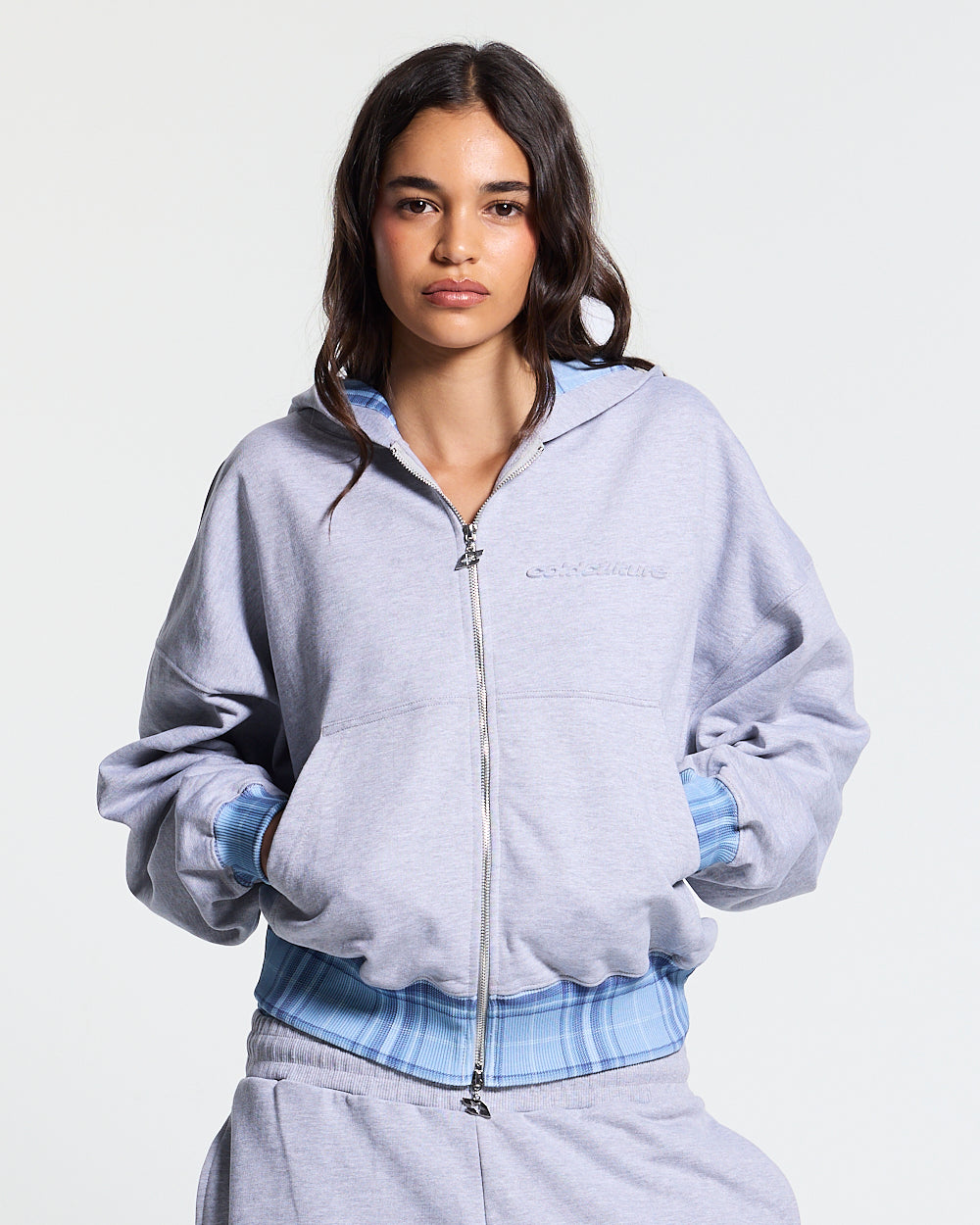 TAKE A PEAK ZIP HOODIE HEATHER GREY - grey zip-up hoodie with plaid trim, front view on female model - Cold Culture #woman