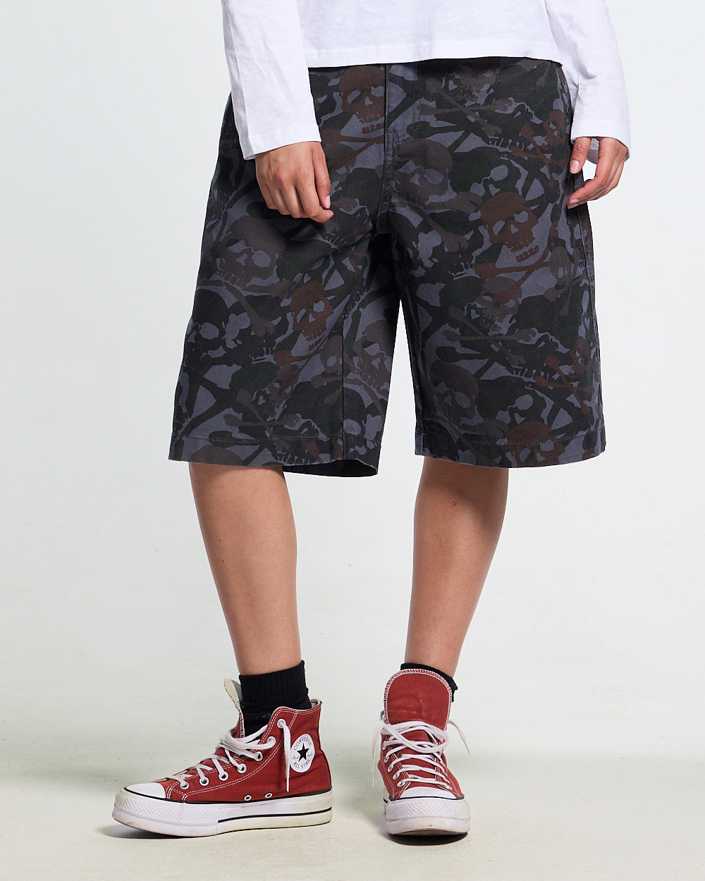NIGHTSKULL SHORTS GREY - grey skull camo shorts, front view on female model - Cold Culture #woman