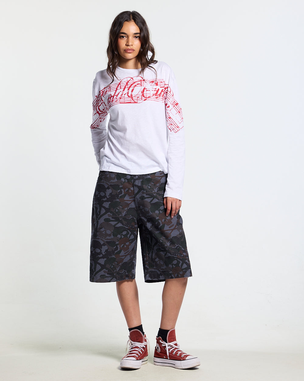 NIGHTSKULL SHORTS GREY - grey skull camo shorts, front view on female model - Cold Culture #woman