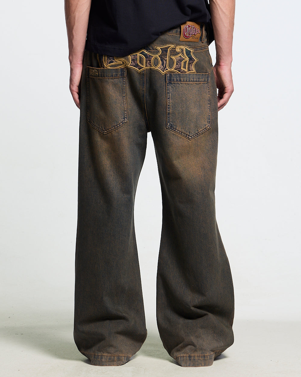 TORN V3 PANTS BLACK - black distressed pants, back view on male model - Cold Culture