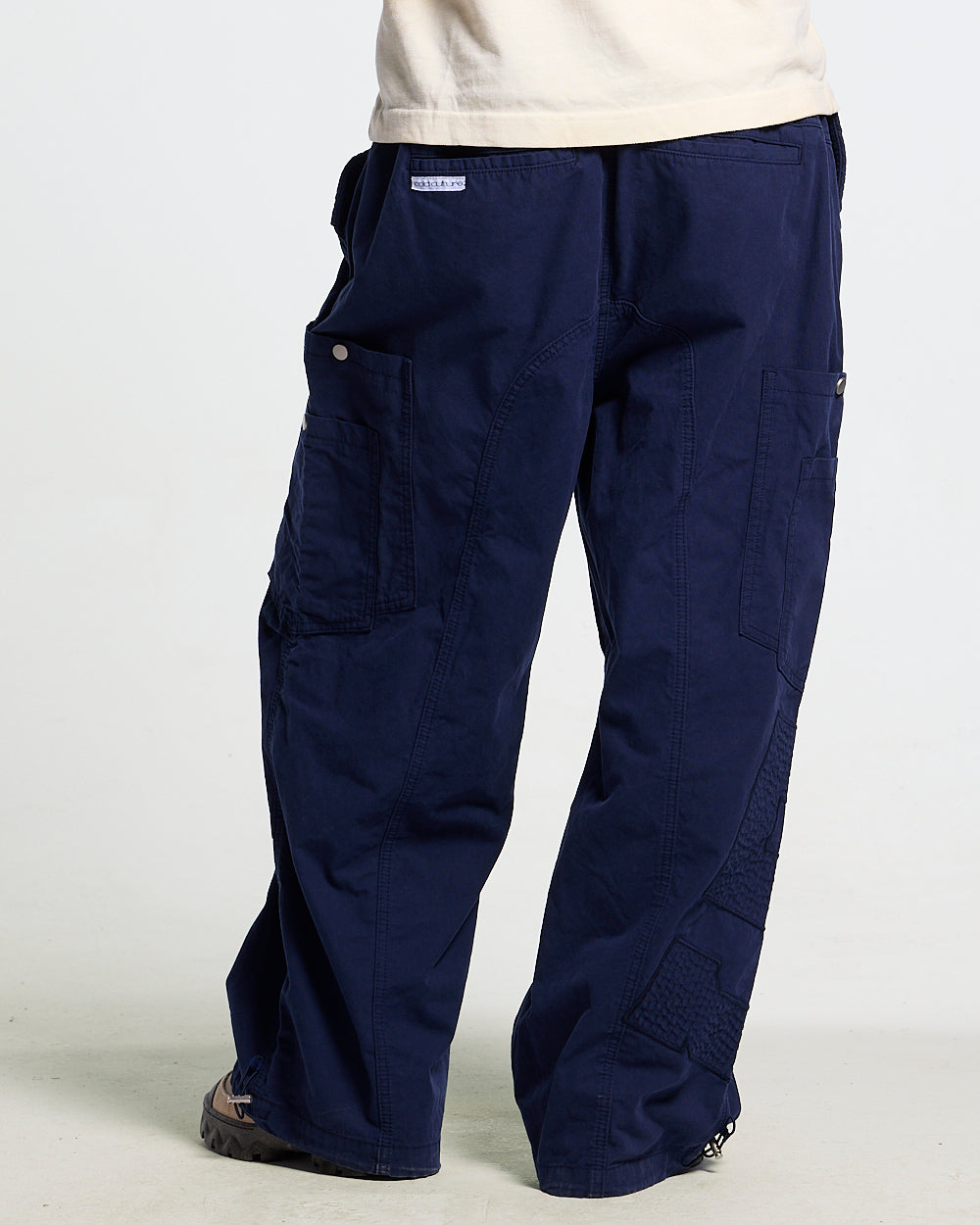 SOLID CARGO PANTS NAVY - navy cargo pants, front view on male model - Cold Culture
