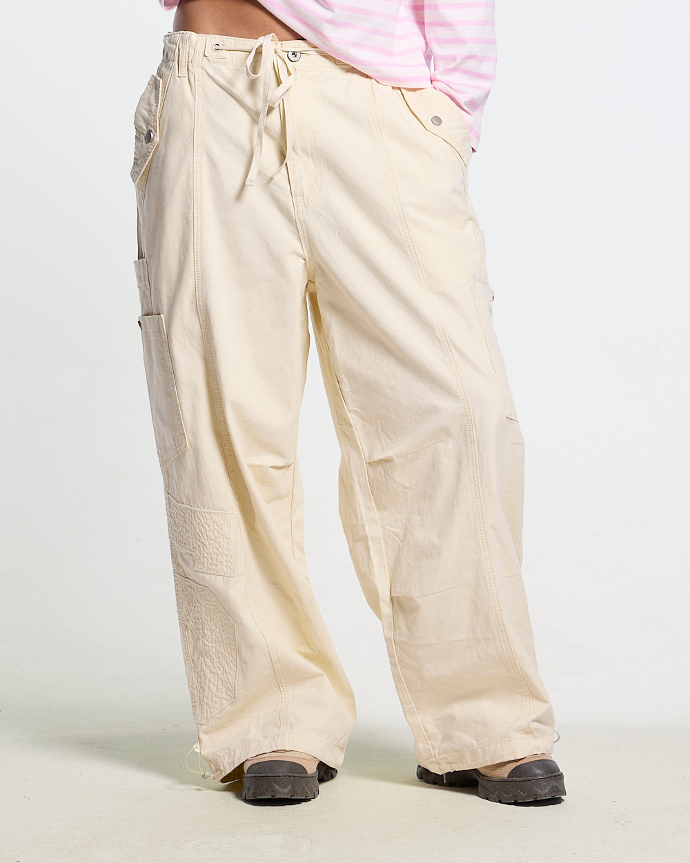 SOLID CARGO PANTS WHITE - off-white cargo pants, front view on female model - Cold Culture #woman